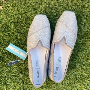 NWT TOMS silver glitter alpargata slip ons